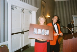Kim Morgan with gift from the gang, with Chris Metz, 2001.